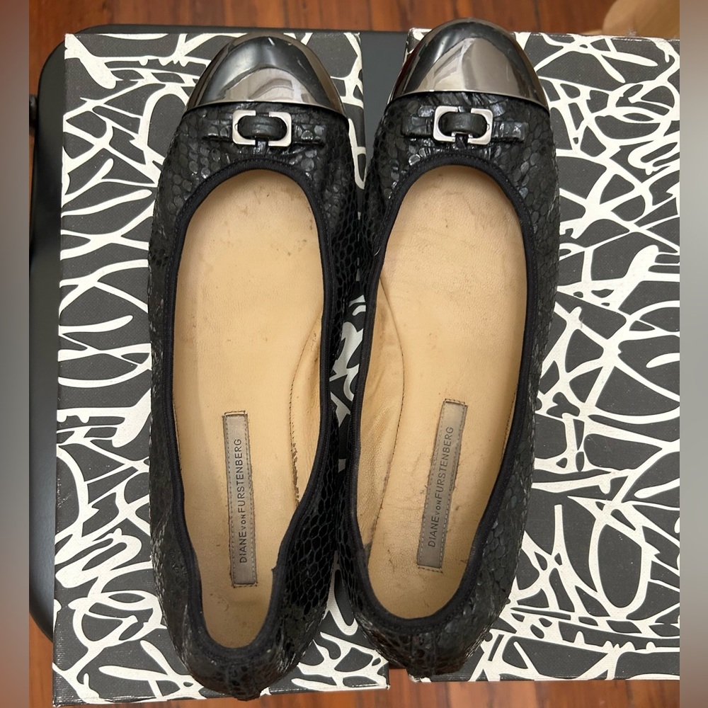 Diane Von Furstenberg “Bonita” snake skin ballet flats.